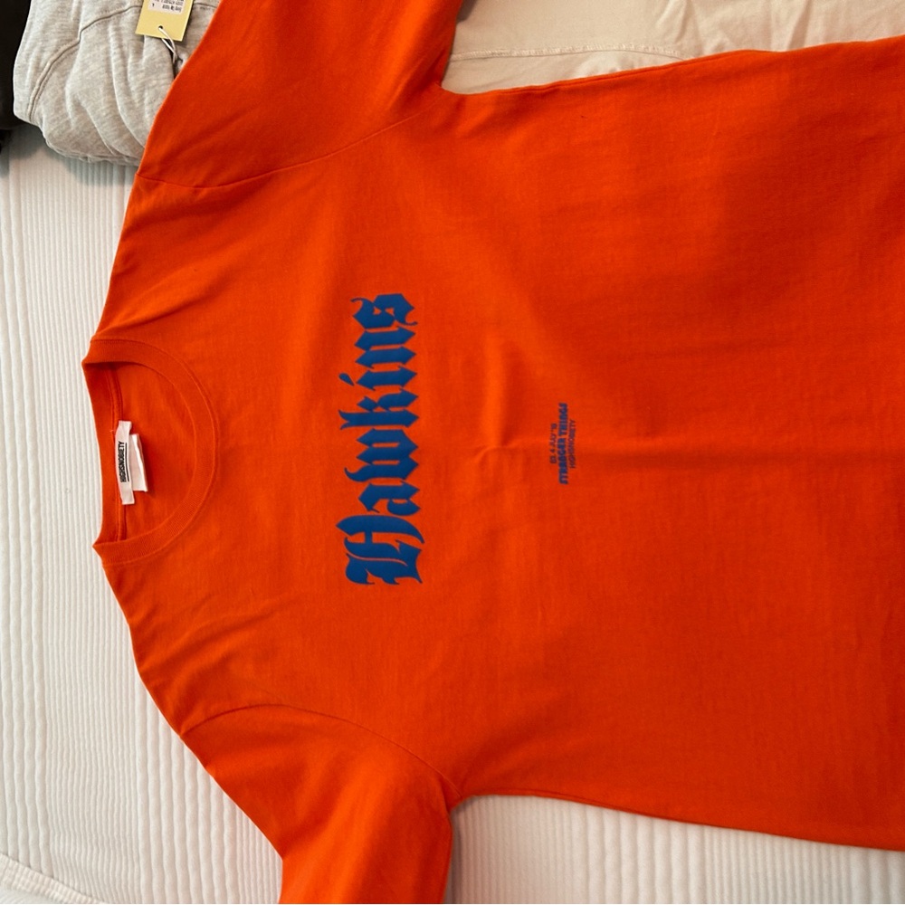 Highsnobiety x Stranger Things - Hawkins Long-sleeve Orange - $50